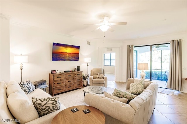 3157 Aviamar Cir Unit 102, Naples, FL 34114 - living room featuring ceiling fan and ornamental molding