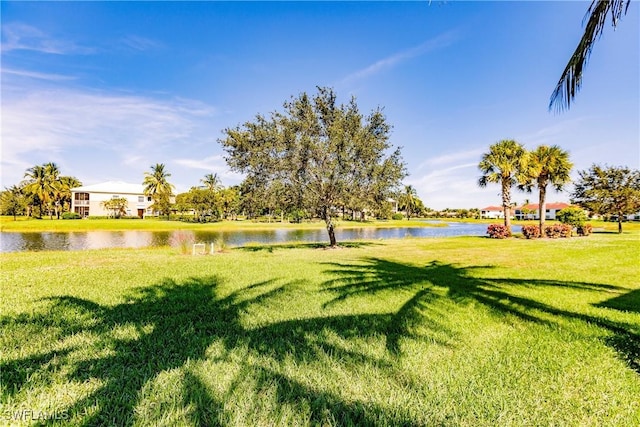3157 Aviamar Cir Unit 102, Naples, FL 34114 - view of property's community featuring a water view and a yard
