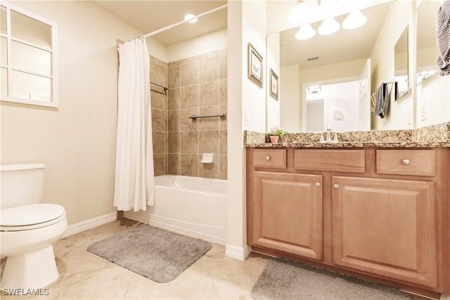 full bathroom featuring toilet, shower / bath combo, vanity, and tile patterned floors