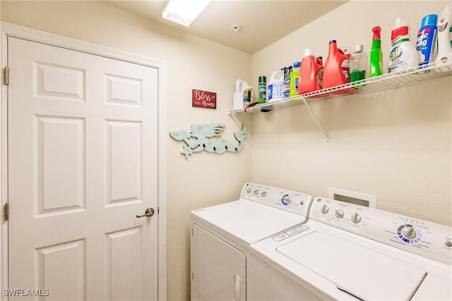 3157 Aviamar Cir Unit 102, Naples, FL 34114 - washroom featuring washing machine and clothes dryer