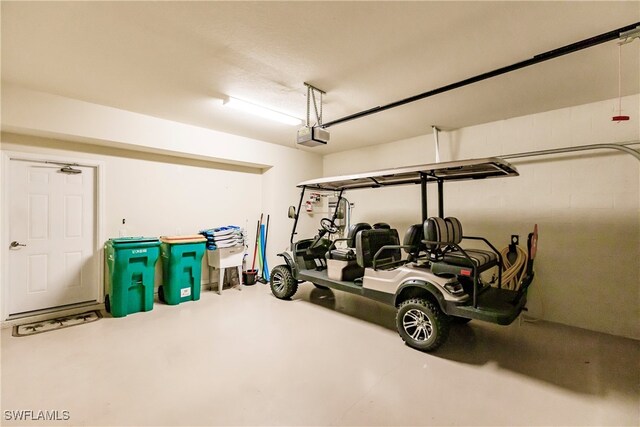 garage featuring a garage door opener