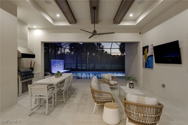 interior space featuring beam ceiling, light tile patterned floors, and ceiling fan