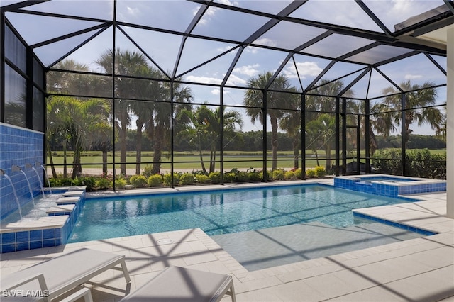 view of swimming pool with pool water feature, an in ground hot tub, and glass enclosure