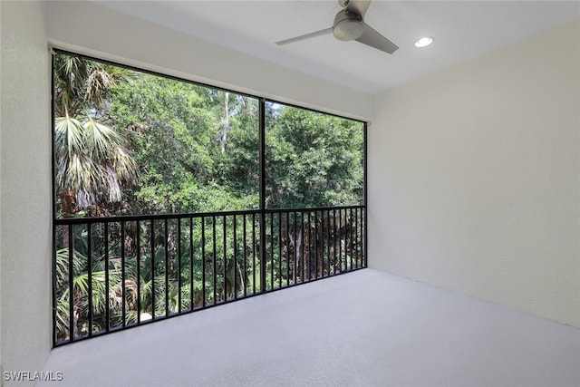 interior space featuring ceiling fan