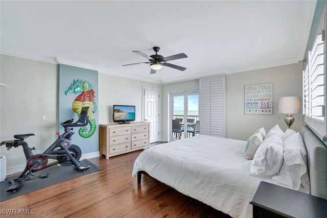 bedroom with access to outside, ceiling fan, dark wood-type flooring, and ornamental molding