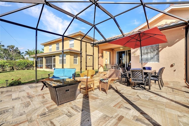 view of patio featuring outdoor lounge area and a lanai