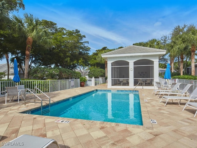 view of pool featuring a patio area