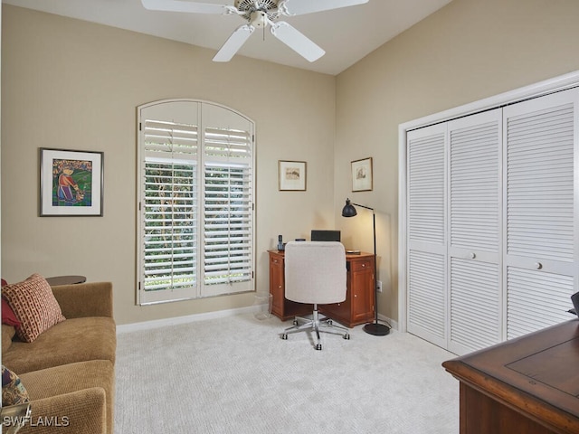 office featuring light colored carpet and ceiling fan