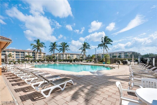 view of swimming pool with a patio area