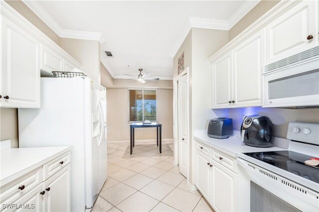 kitchen with white appliances, light tile patterned flooring, white cabinetry, ceiling fan, and crown molding