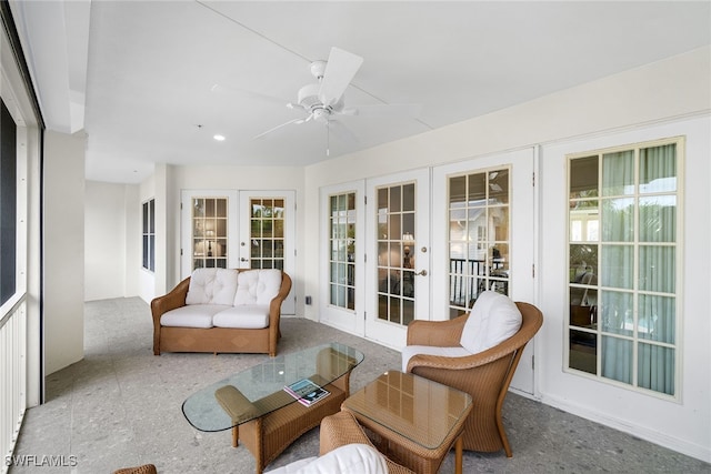 sunroom / solarium with french doors and ceiling fan