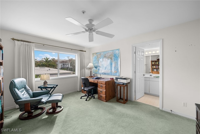 office with ceiling fan and light colored carpet