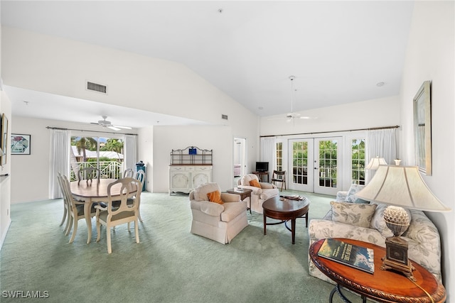 living room featuring carpet flooring, ceiling fan, and french doors