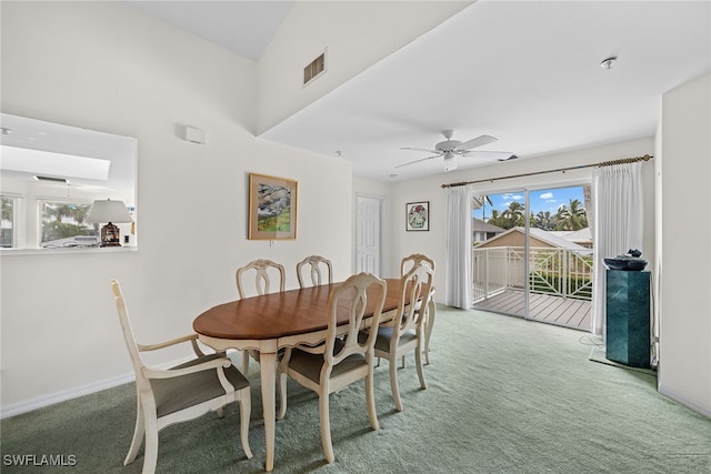 dining space featuring ceiling fan and carpet floors