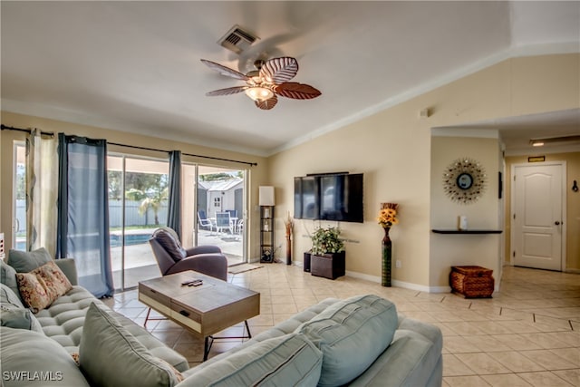 tiled living room with ceiling fan, lofted ceiling, and crown molding