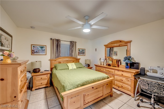 bedroom featuring ceiling fan and light tile patterned flooring