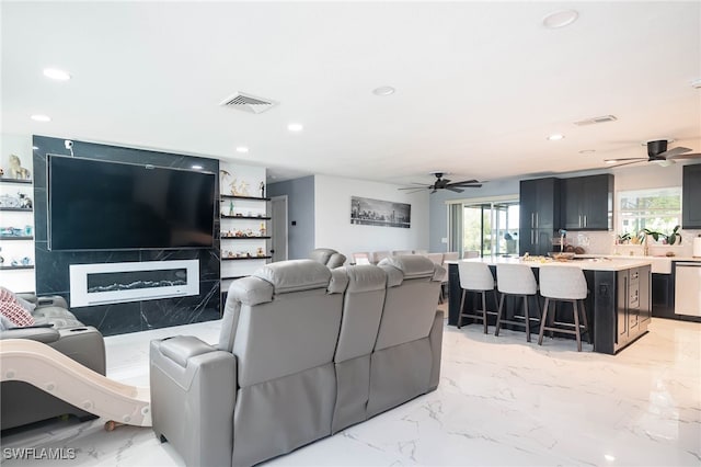 living room with ceiling fan