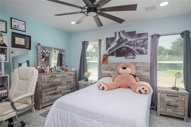 bedroom featuring ceiling fan