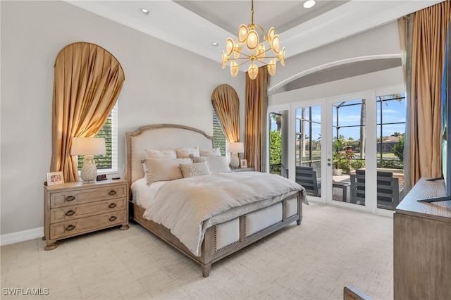 bedroom with a notable chandelier and access to outside