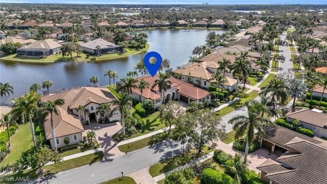 drone / aerial view with a water view