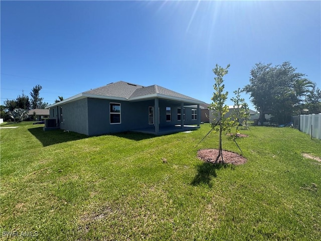 2919 NW 10th St, Cape Coral, FL 33993 - back of property featuring stucco siding
