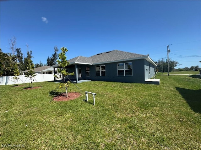 2919 NW 10th St, Cape Coral, FL 33993 - rear view of property with stucco siding and a shingled roof