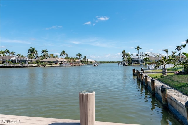 dock area featuring a water view