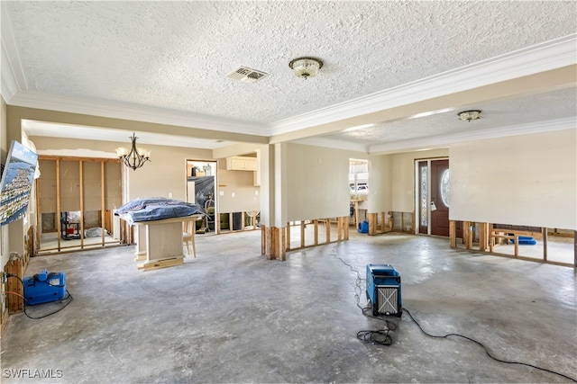 miscellaneous room with crown molding, concrete flooring, and a textured ceiling