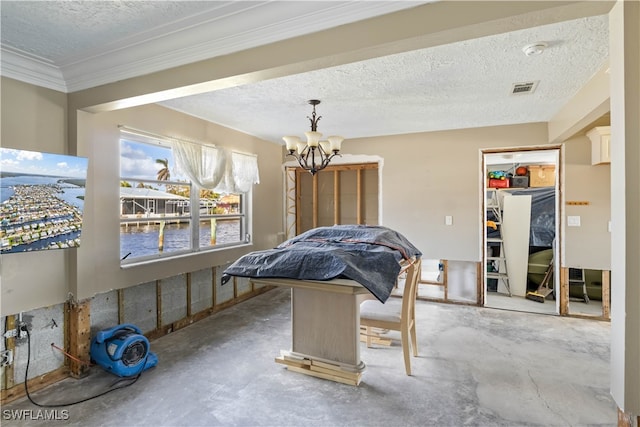 dining room with an inviting chandelier, concrete floors, a textured ceiling, and ornamental molding