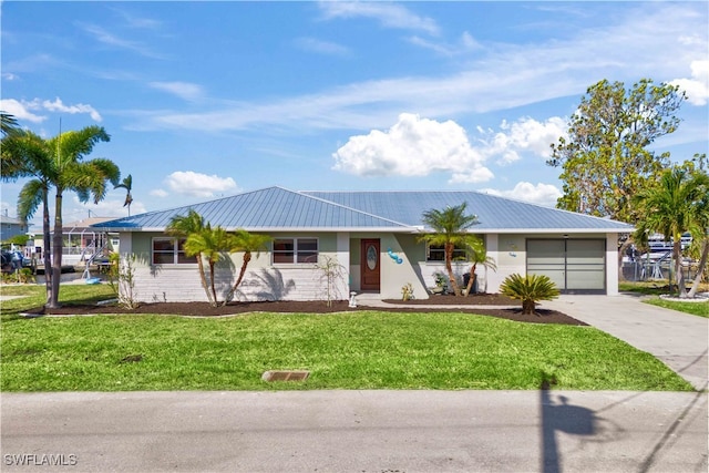 single story home with a front yard and a garage