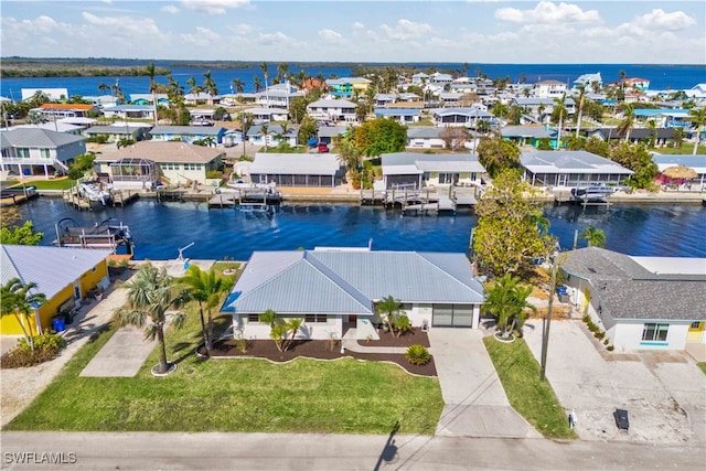 aerial view featuring a water view