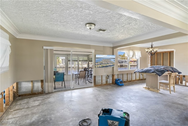 interior space with concrete floors, a textured ceiling, plenty of natural light, and crown molding