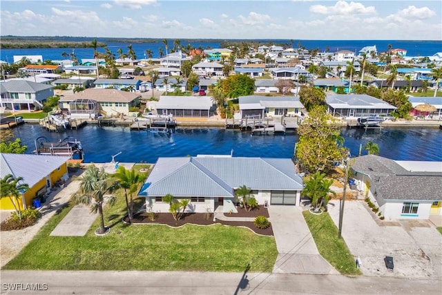 bird's eye view with a water view