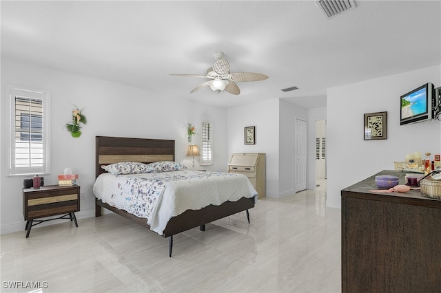 bedroom with a closet and ceiling fan