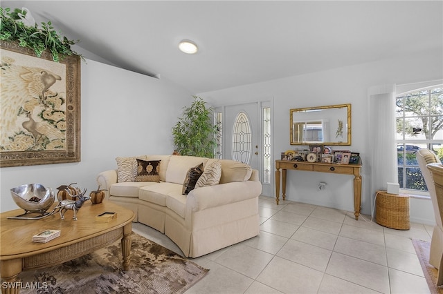 tiled living room with lofted ceiling