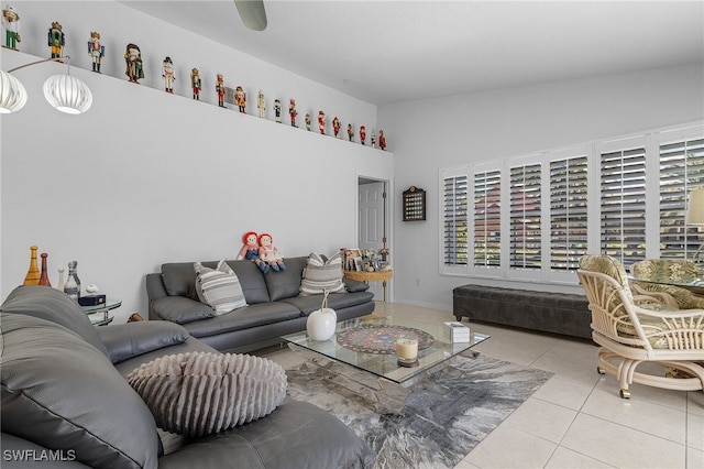 tiled living room featuring lofted ceiling