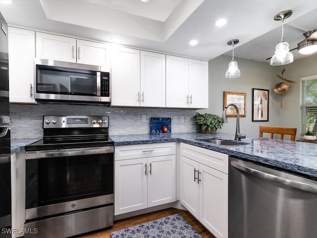 kitchen featuring sink, white cabinets, and stainless steel appliances