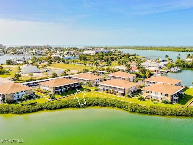 drone / aerial view featuring a water view