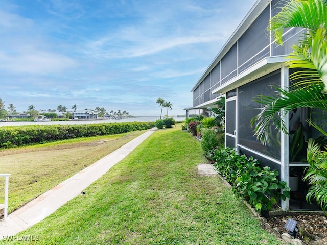 view of yard with a sunroom