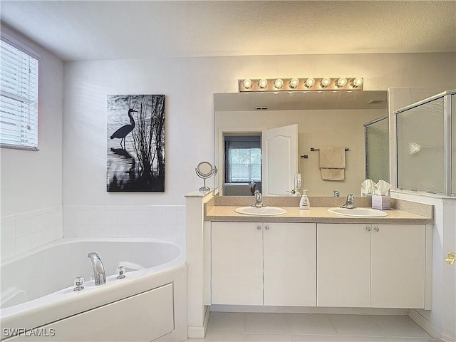 2505 Keystone Lake Dr, Cape Coral, FL 33909 - full bath featuring a sink, plenty of natural light, and a bath