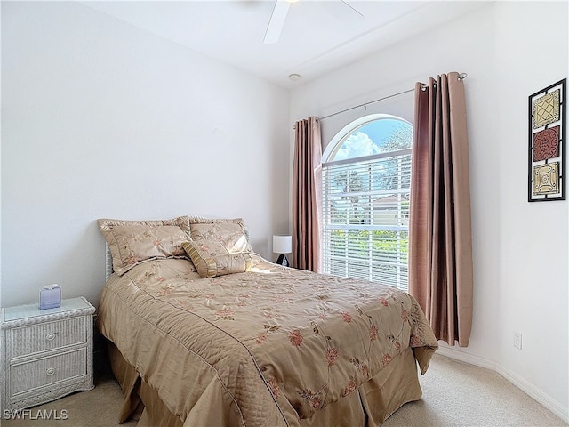 bedroom with ceiling fan and carpet flooring