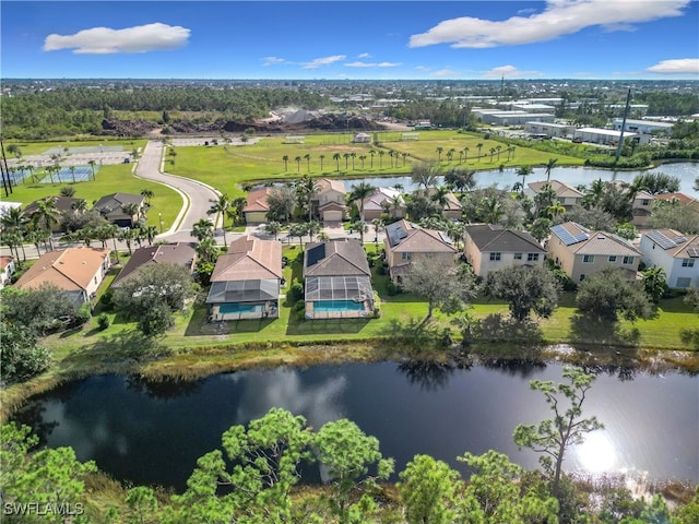 drone / aerial view with a water view