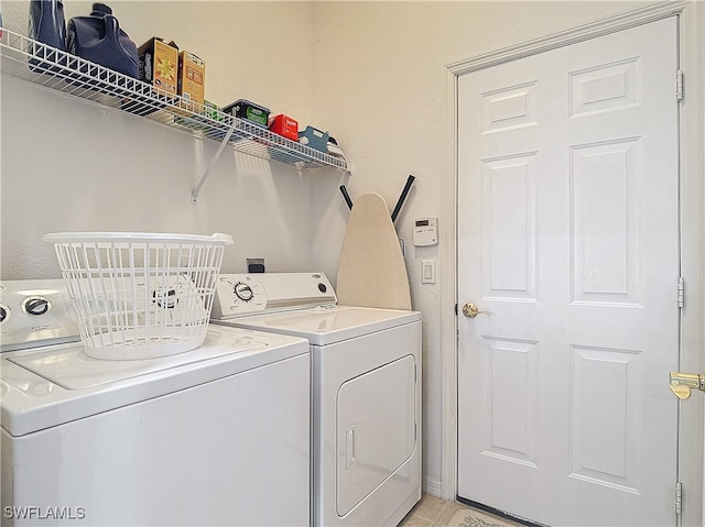 laundry area featuring independent washer and dryer