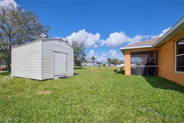 view of yard with a shed