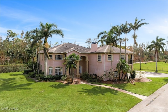 view of front of house with a front lawn