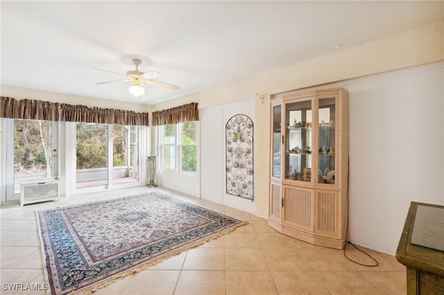 interior space featuring ceiling fan