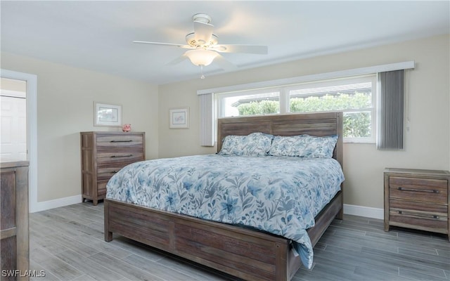 bedroom featuring ceiling fan and wood-type flooring