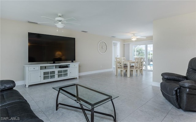 living room with ceiling fan