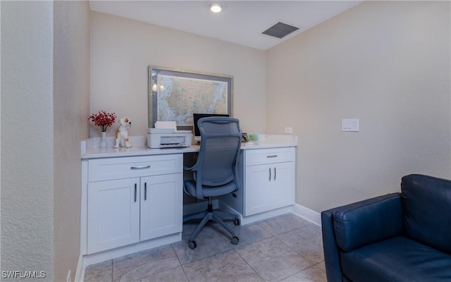 office space featuring light tile patterned floors