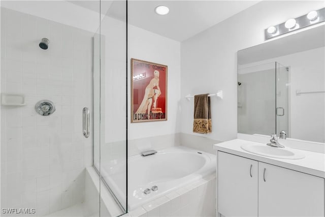 bathroom with vanity and plus walk in shower